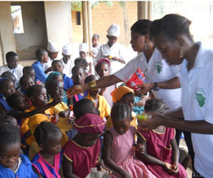 volunteers giving some stuff